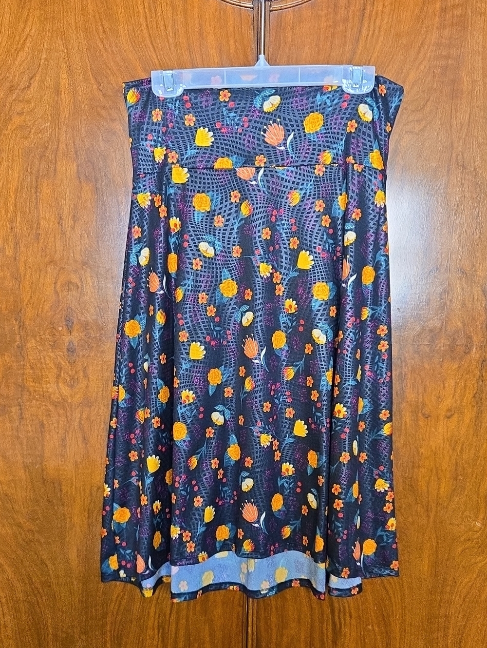 LuLaRoe Black Shimmer Asymmetrical Skirt with Orange & Yellow Floral Motif